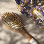 Trousse de toilette N°113 Bleu de byzantine avec une brosse à cheveux