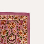Petit foulard N°114 Rose vu à plat, motif fleuri et bordure rose