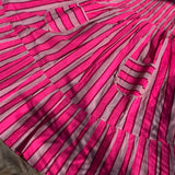 Détail de la jupe à volants et des poches de la robe Froufrou Fluo Pink