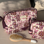 grande trousse de toilette femme fleurie couleur écru et prune